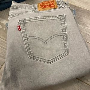 9 gently used Levi 511 men’s jeans.